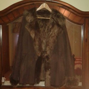 Raccoon fur lined and outside is sueded